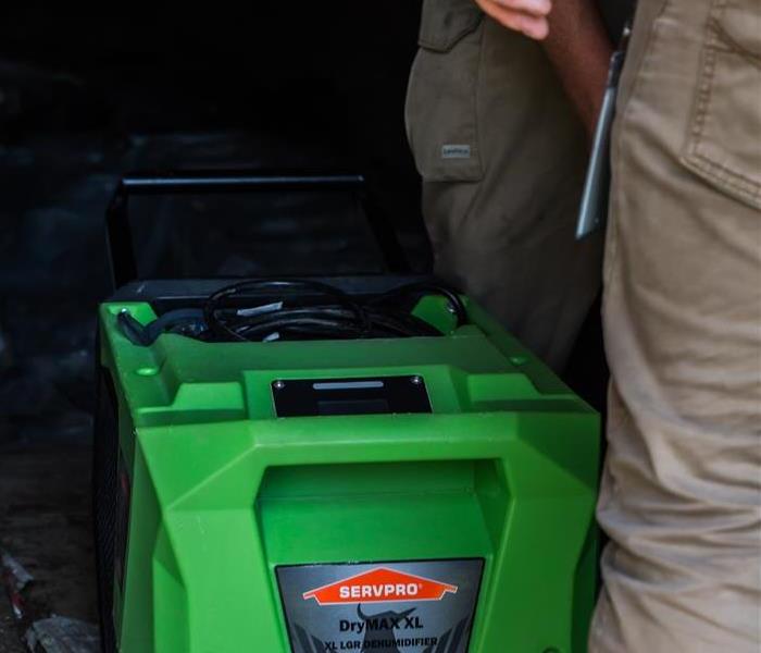 SERVPRO technicians working in commercial building