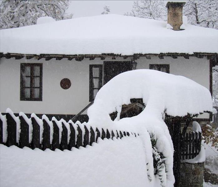 snow on a house